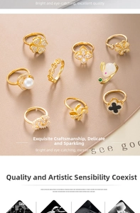 Collection of gold-plated adjustable rings featuring clover, pearl, and fashion motifs