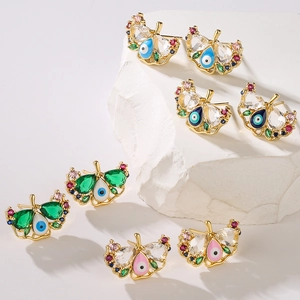 Golden butterfly stud earrings with evil eye motif and colorful zircon gemstones