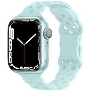 Detalle de la correa de silicona verde menta con recortes y funda mate para Apple Watch