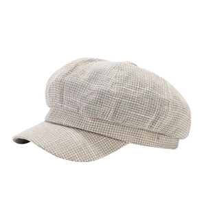 Classic British style newsboy cap with beige plaid texture for casual summer wear