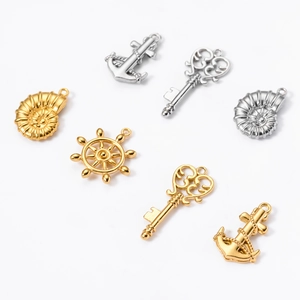 Retro stainless steel nautical pendants featuring anchor, key and rudder in gold and silver