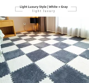 Detail of plush puzzle foam floor mats with soft interlocking grey and white squares
