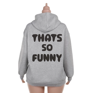 Close-up of THATS SO FUNNY black bold text print on back of light grey oversized hoodie
