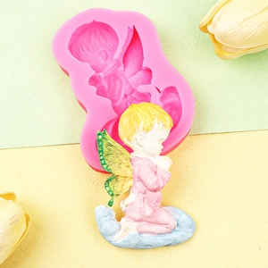 Pink silicone angel mold with hand-painted praying baby resin figure on floral background
