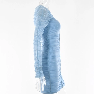 Side view of light blue mesh dress featuring ruched texture and long sleeves detail