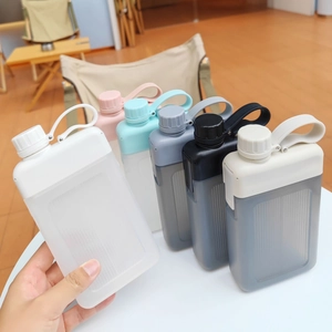 Detail showing various colors of flat portable water bottles with striped texture and handle