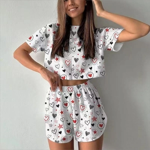 Close-up detail of heart and star print on the short-sleeved pajama set for women