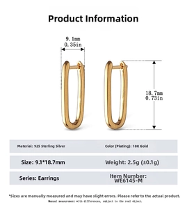 Detailed view of U-shaped 925 silver earrings with 18K gold plating and sizing specs