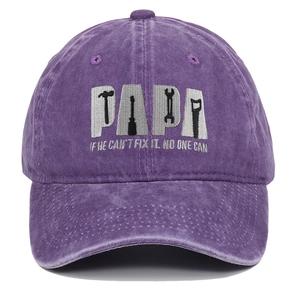 Close-up of vintage purple washed baseball cap with PAPA embroidery and tool icons