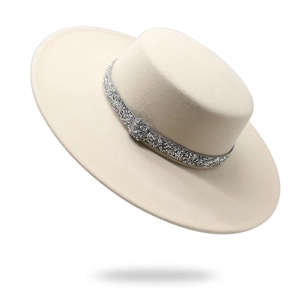 Elegant beige wool boater hat with a sparkling silver rhinestone band on white background