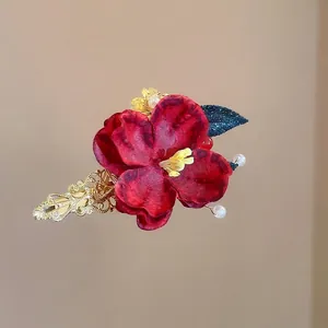 Elegant Chinese style red floral hair clip with white pearls and gold metal tassel