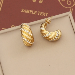 Gold C-shaped twisted earrings with inlaid sparkling crystals for women's luxury style