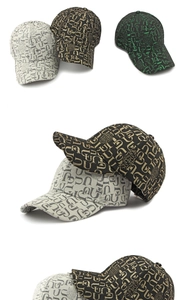 Detailed view of six-panel baseball caps with monogram pattern in multiple colorways