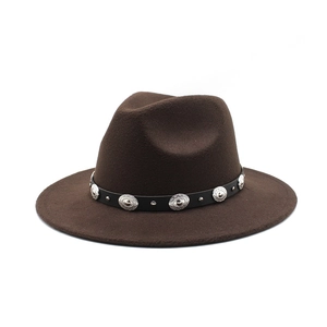 Dark brown wool fedora hat featuring a vintage silver concho leather band on white background