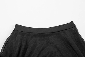 Detailed close-up of high-waist elastic band and sheer black mesh texture of the dress