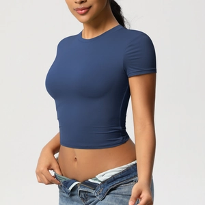 Close-up of high-elasticity dark blue crop top showing slim fit and round neckline detail