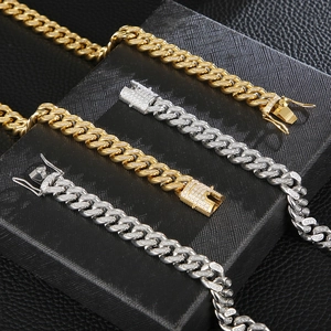 Detailed view of hip hop Cuban link necklaces and bracelets with gold and silver rhinestone