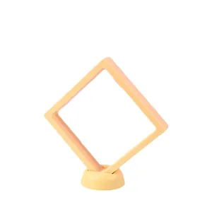 Creamy yellow PE film floating jewelry display box with round base for rings and coins