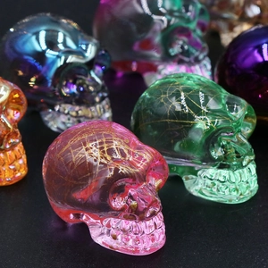 Colorful crystal skull ornaments with golden textures for creative Halloween home decor