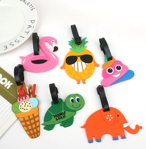 Colorful silicone luggage tags in cartoon shapes like flamingo and pineapple for travel