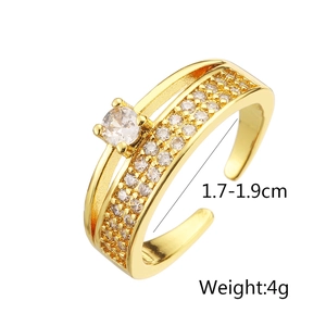 Detail view of double-layer gold-plated ring with micro-paved zircons and center stone