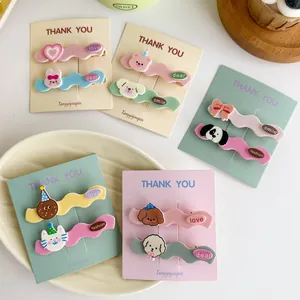 Close-up of cute 3D resin animal hair clips in pastel colors on display cards