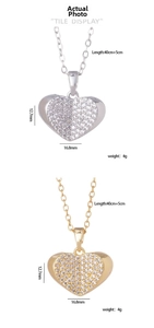 Detail view of heart pendants in gold and silver finish with zircon micro-pave setting