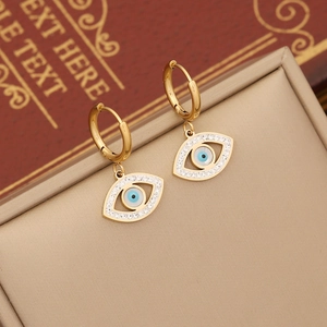 Golden evil eye hoop earrings with sparkling white crystals and blue eye detail