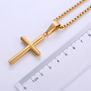 Polished 18k gold plated cross pendant measurement with ruler showing 4.5cm length