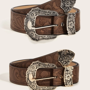 Vintage western embossed leather belts with floral patterns in silver and gold buckles