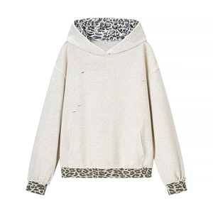 Fashionable beige hoodie with leopard print splicing and distressed hole details