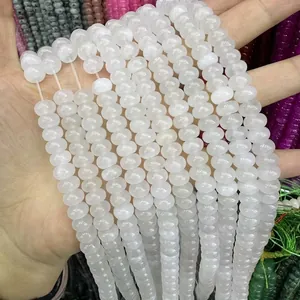 Macro shot of 5x8mm translucent white abacus natural stone beads for DIY jewelry making