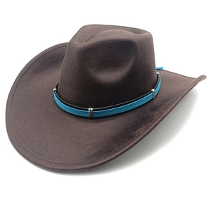 Detail of the brown felt cowboy hat showing the blue decorative band and silver buckles