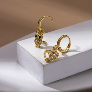 Golden owl and heart earrings set with zircon stones and asymmetrical drop designs