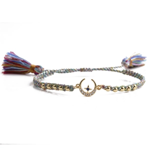 Handmade woven bracelet with golden moon charm, zircon stars and colorful tassels