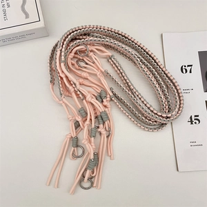 Detail view of pink and grey hand-woven adjustable shoulder strap with silver metal rings