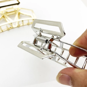 Minimalist silver geometric metal hair claw clip with cutout design and strong spring