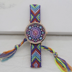 Detail view of Bohemian purple woven strap watch with mandala pattern and rose gold case