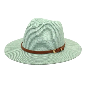 Mint green wide brim Panama straw hat with brown leather belt and gold buckle details