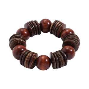 Bohemian style bracelet with geometric wooden beads and coconut shell discs on white background