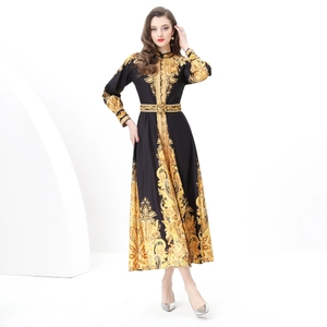 Elegant long sleeve maxi dress with gold baroque print and matching belt for spring 2025