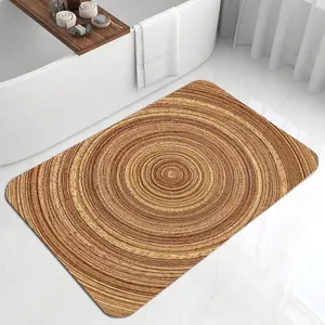 Absorbent diatomite bath mat with realistic wood grain pattern on marble floor