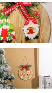Detail of wooden Christmas welcome sign with 3D gnome, pine branches, and red ribbon