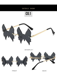 Detailed multi-angle view of rimless butterfly shaped sunglasses with gold metal temples