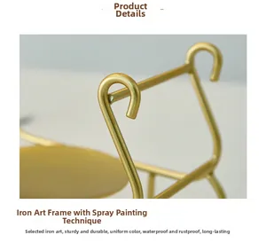 Detail of Nordic iron candle holder with smooth gold lacquer finish and rustproof coating