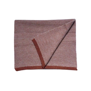 Coperta in maglia a spina di pesce terracotta e crema con bordi a coste rifiniti