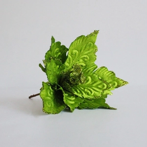 Glittery green velvet poinsettia Christmas flower decoration with embossed leaf details