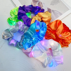 Colorful LED glowing satin scrunchies for hair in a bulk pack with glowing lights