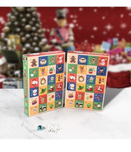 Close-up of a 24-day Christmas advent calendar blind box with festive red and green designs