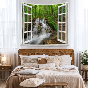Detail of 3D window forest waterfall tapestry hanging over a bedroom headboard